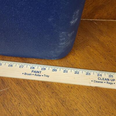 :1 Coleman Blue cooler, white lid on wheels;