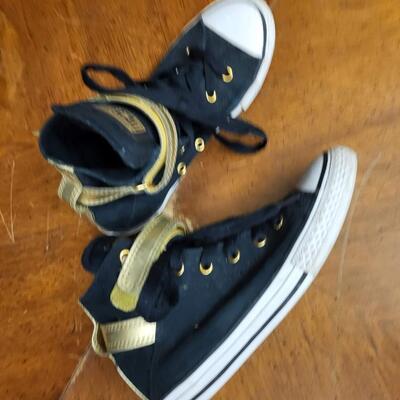 Shoes:1 Converse Size 3 Black and gold hi top converse;