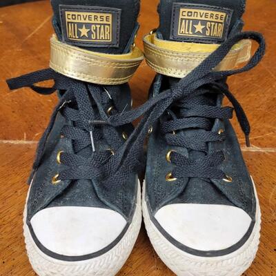 Shoes:1 Converse Size 3 Black and gold hi top converse;
