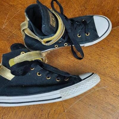 Shoes:1 Converse Size 3 Black and gold hi top converse;