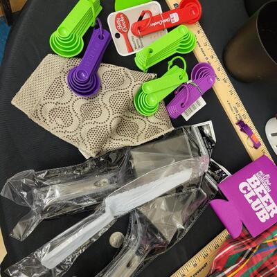 Kitchen:Box Lot Apron, plastic serving ware, measuring spoons,;