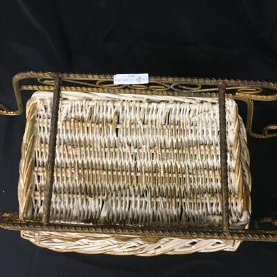 : White wicker and metal sleigh;