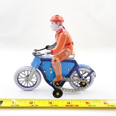SCHYLLING WIND UP TIN TOY - MAN ON MOTORCYCLE