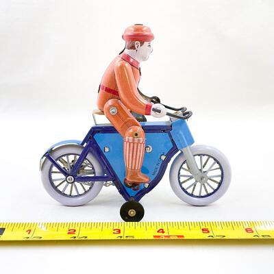 SCHYLLING WIND UP TIN TOY - MAN ON MOTORCYCLE
