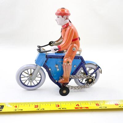 SCHYLLING WIND UP TIN TOY - MAN ON MOTORCYCLE