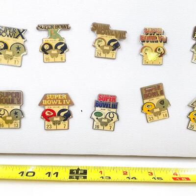 STARLINE COLLECTION OF 25 SUPERBOWL ENAMEL PINS ON CANVAS