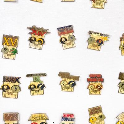 STARLINE COLLECTION OF 25 SUPERBOWL ENAMEL PINS ON CANVAS
