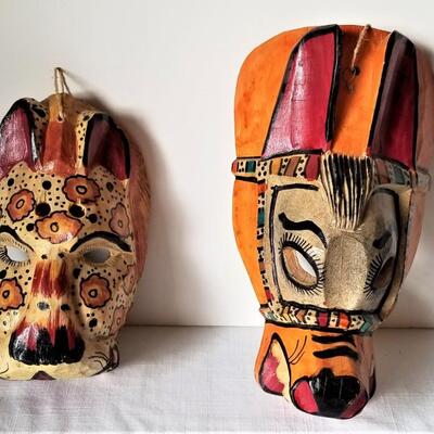Lot #77  Two Carved Wooden Masks