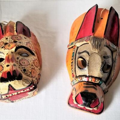 Lot #77  Two Carved Wooden Masks