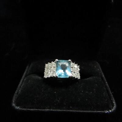LOT 59  LADIES STERLING RING WITH TEAL STONE