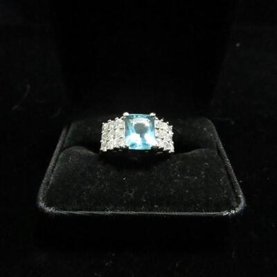 LOT 59  LADIES STERLING RING WITH TEAL STONE