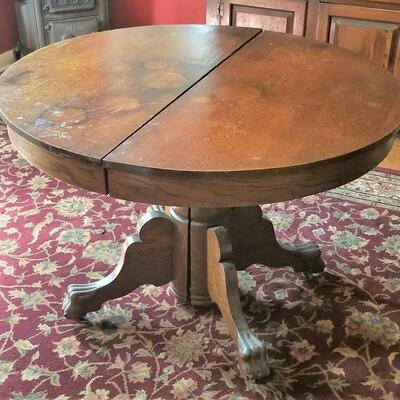 Lot #81  Antique Dining Room Table with 6 leaves