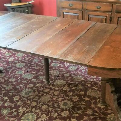 Lot #81  Antique Dining Room Table with 6 leaves