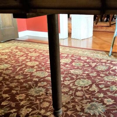 Lot #81  Antique Dining Room Table with 6 leaves