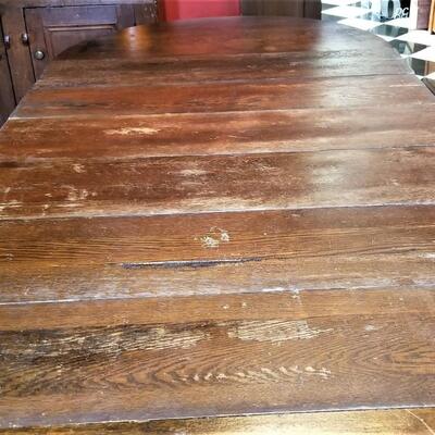 Lot #81  Antique Dining Room Table with 6 leaves