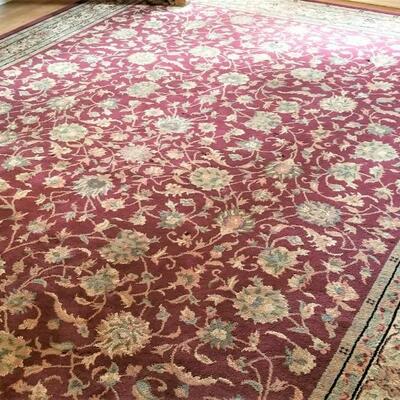 Lot #104 Room Sized Rug with Burgundy tones - traditional styling