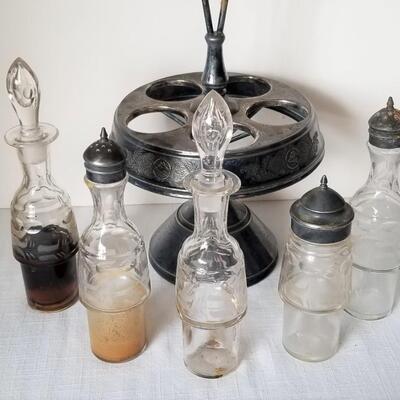 Lot #109  Victorian Silver Plate Condiment Set with 5 bottles