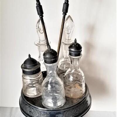 Lot #109  Victorian Silver Plate Condiment Set with 5 bottles