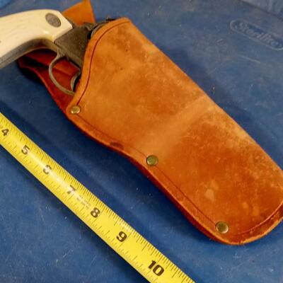 LOT 201  OLD CAP PISTOL AND LEATHER HOLSTER