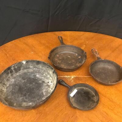 : 4 graduated Cast Iron Skillets;