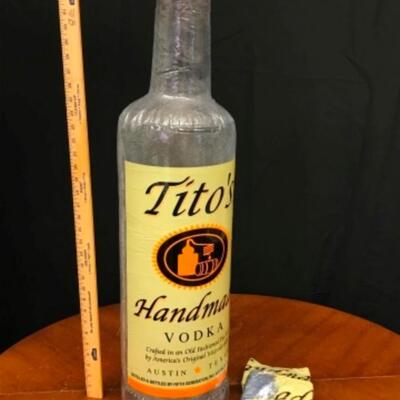 Gifts: 5 36" inflatable Tito's bottles;