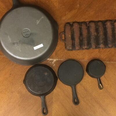 : Cast Iron Lot; 4 gradudated skillets, cornbread pan;