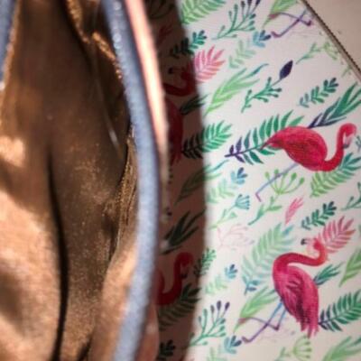 Purses / hangbags: Coleman multi colored bookbag;