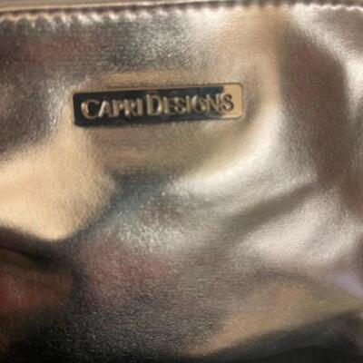 Purses / handbags: Large brown purse, large Silver purse, 7 smaller bags;