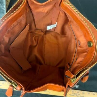Purses / handbags: Large brown purse, large Silver purse, 7 smaller bags;