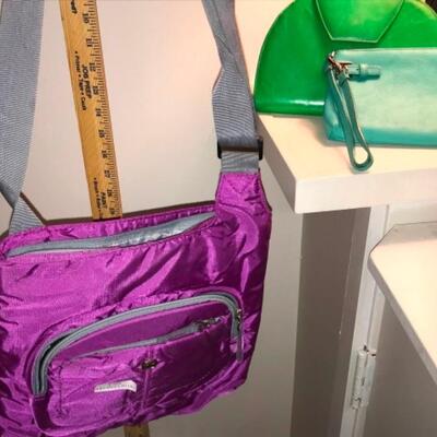Purses / handbags: Purple purse, green purse, blue purse;