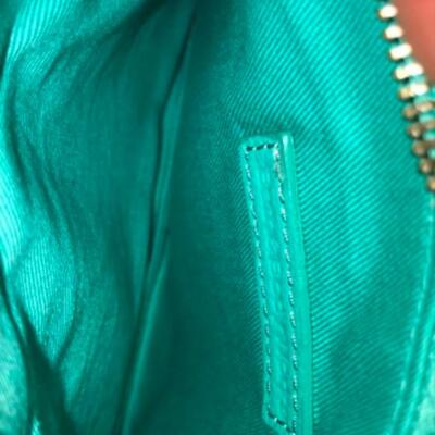 Purses / handbags: Purple purse, green purse, blue purse;