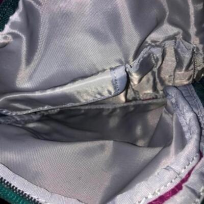 Purses / handbags: Purple bookbag;