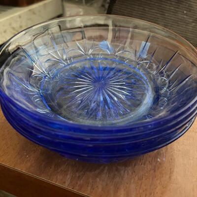 Set of four vintage clear blue bowls