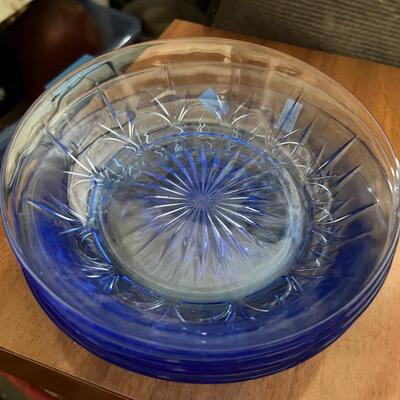 Set of four vintage clear blue bowls
