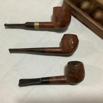 3 pipes with holder
