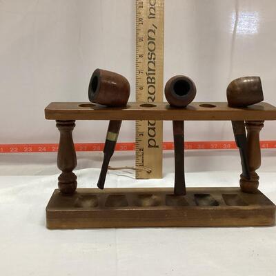 3 pipes with holder