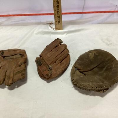 antique baseball mitt and globes