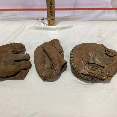 antique baseball mitt and globes