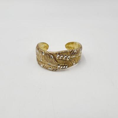 HEAVY GOLD TONED FEATHER CUFF BRACELET