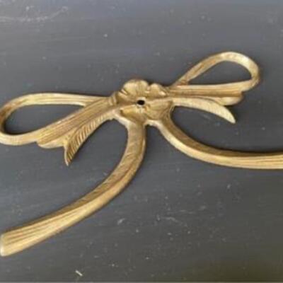 Solid brass bow wall hanging