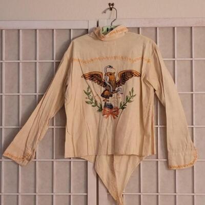 Lot 120: Vintage Child's Mexican Embroidered Shirt and White Leather Boots