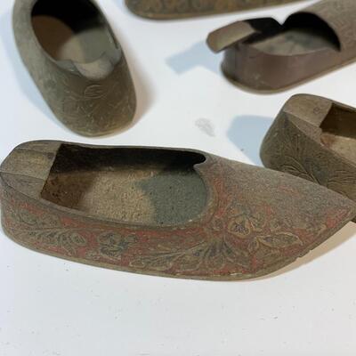 GROUP OF MINIATURE BRASS SHOES