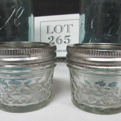 4 Old Teal Canning Jars and 2 Small clear Jars