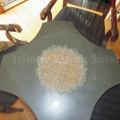 Round pedestal table with four armchairs