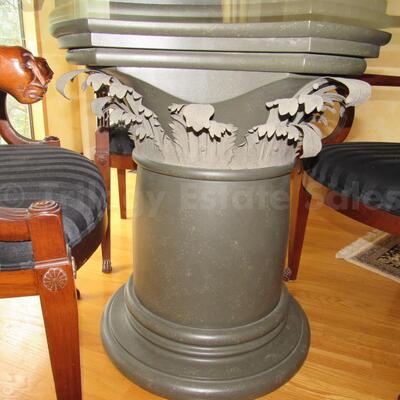 Round pedestal table with four armchairs