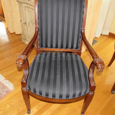 Round pedestal table with four armchairs