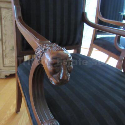 Round pedestal table with four armchairs