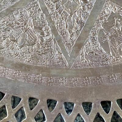 Hand chased Persian reticulated edge footed round tray
