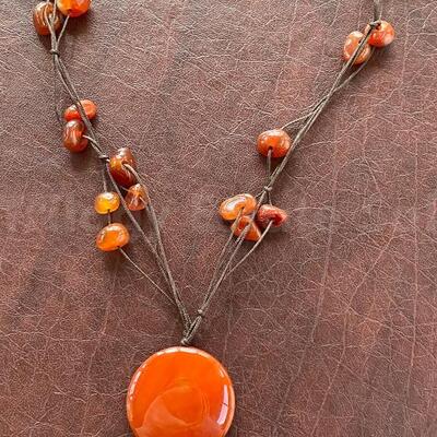 amber/red-orange polished stone/glass beads necklace