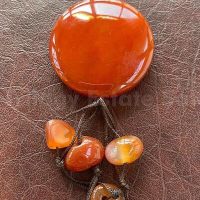 amber/red-orange polished stone/glass beads necklace